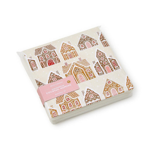 Set of cocktail napkins with gingerbread house design on a white background