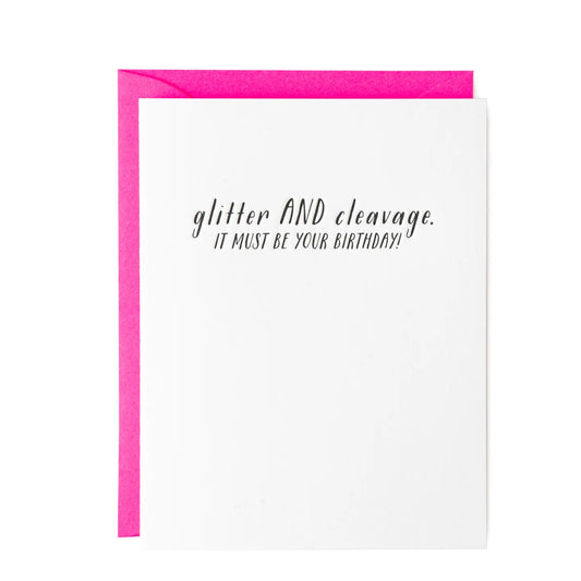 white Birthday greeting card with "glitter and cleavage, it must be your birthday' in black text with hot pink envelope