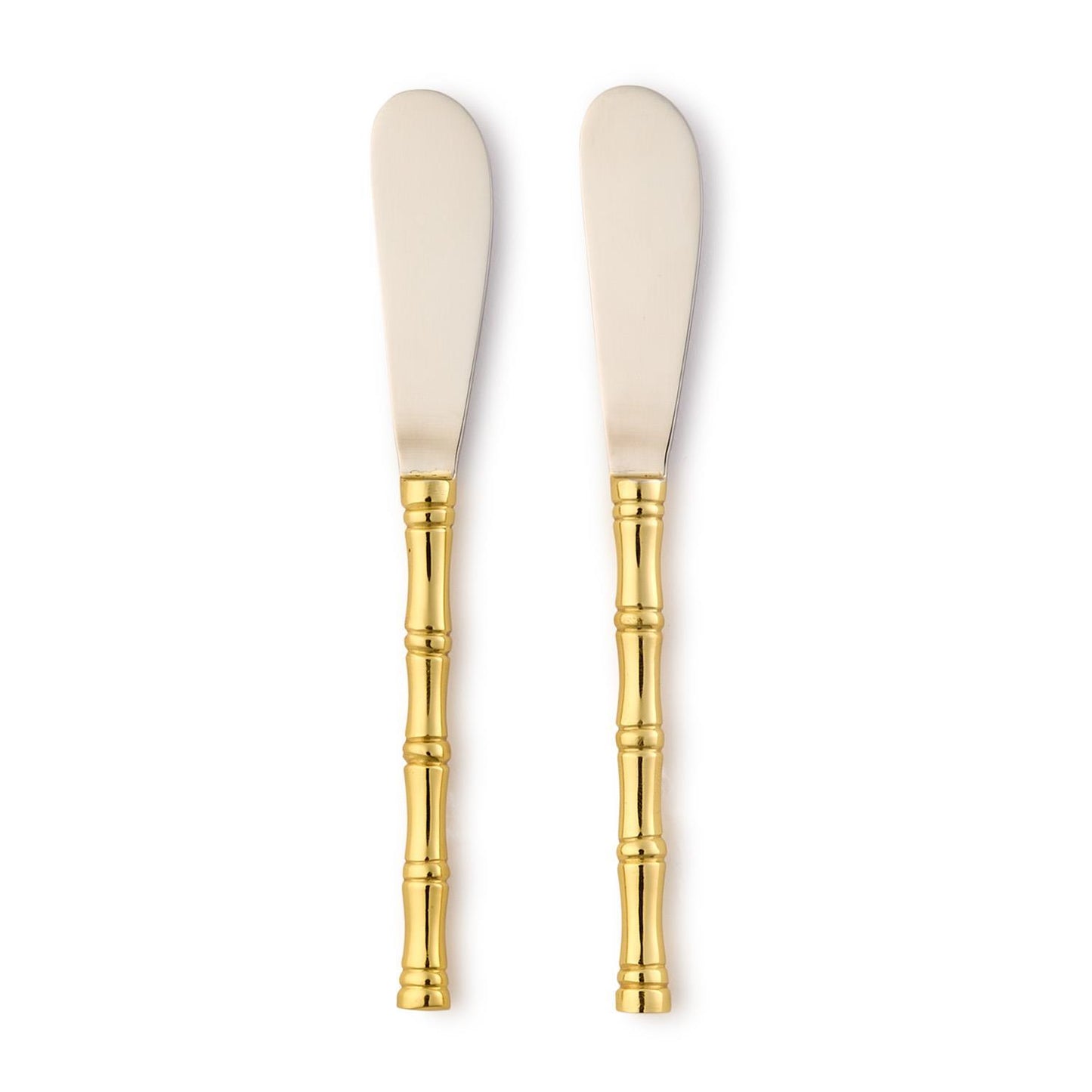 Two spreader knives with gold handles on a white background