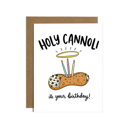 White card that has a Cannoli in the middle with candles on it and black words