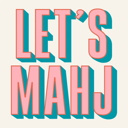 'LET'S MAHJ' text in pink and blue letters on a white cocktail napkin.
