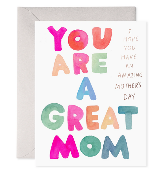 White mothers day card with with colorful font and a gold message on the top right.