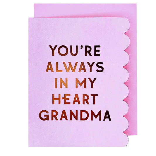 Pink Greeting Card with 'You're always in my heart Grandma' text with scalloped vertical edge 