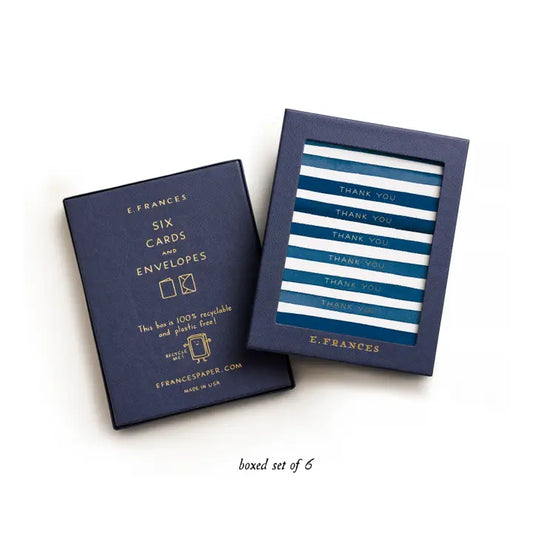 Box Set of cards navy stripe that repeats with thank you in silver foil that repeats.