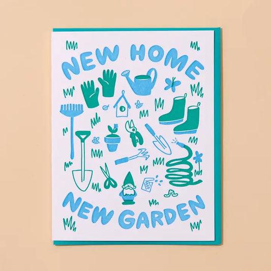 A greeting card with a white background and teal border, featuring the words 'NEW HOME' at the top and 'NEW GARDEN' at the bottom in teal lettering. The center is decorated with various gardening illustrations in teal, including gloves, boots, a watering can, a rake, a shovel, a hose, a gnome, and plants.