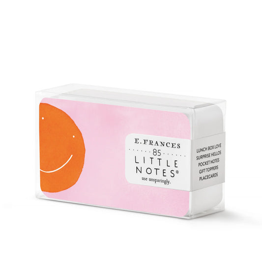 Pink little notes with a orange smiley face on the left.