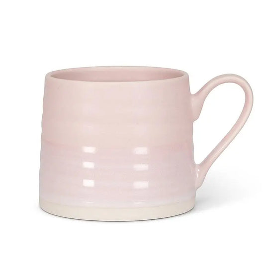 Soft Pink ceramic mug with ridges on a white background