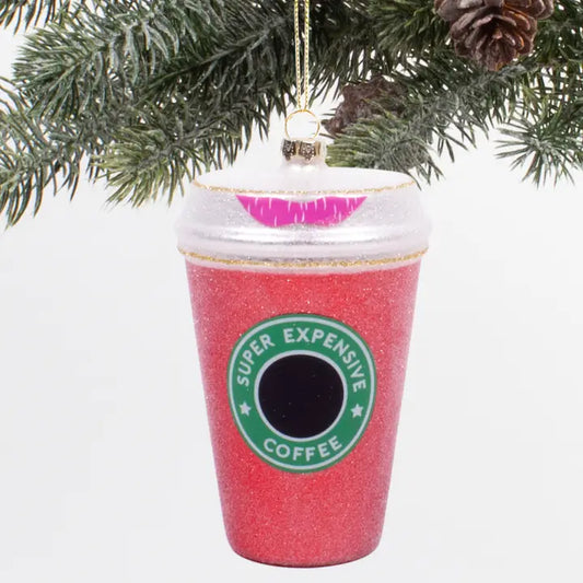 Red sparkle ornament that has a green label and white top