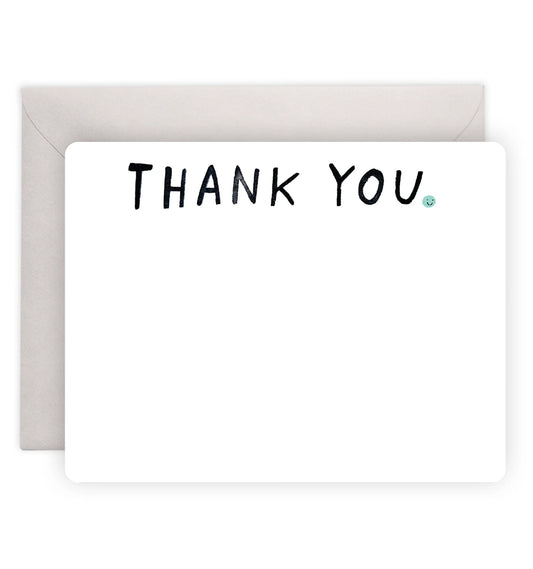 Flat note card with Thank You in black on the top center