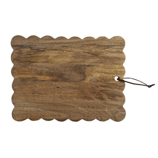 Wooden cutting board with white scalloped edge