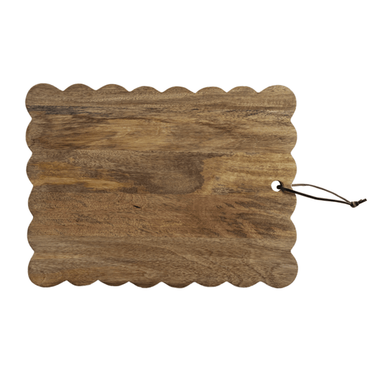 Wooden cutting board with white scalloped edge
