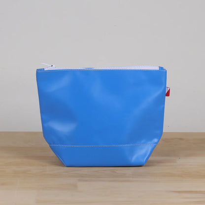 Blue Pouch with water resistant material and white zipper