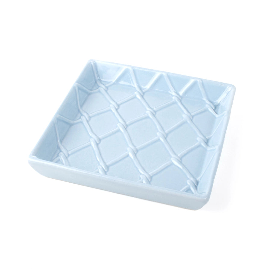 Light blue ceramic dish with geometric pattern 