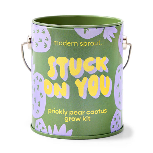 Prickly pear cactus grow kit in green paint can with lavender prickly pear design and "Stuck on you" in yellow lettering