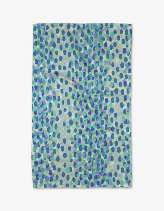 kitchen towel with a variety of shades of blue spots