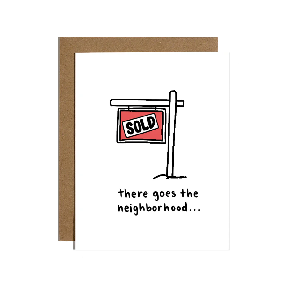 White greeting card with red sold sign that has 'there goes the neighborhood' written below it