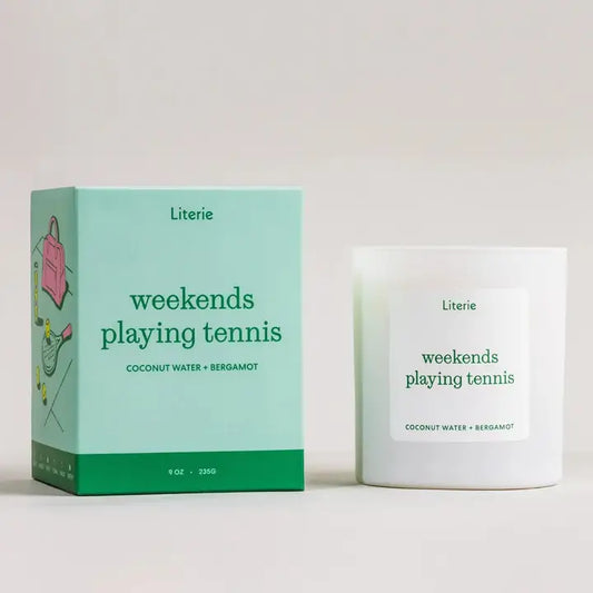 Literie candle in glass tumbler and packaging in mint and green with "weekends playing tennis" printed in green coconut water & bergamot scented
