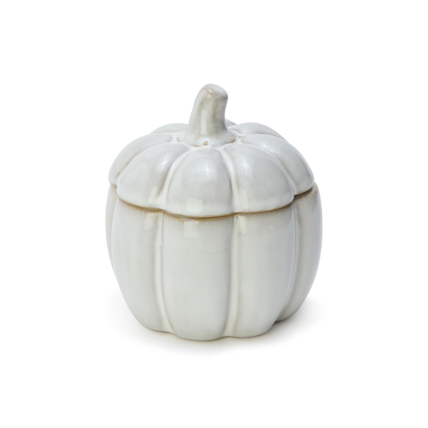 White ceramic pumpkin-shaped container on a white background