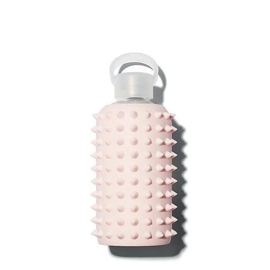 pink glass waterbottle with rubber spikes 