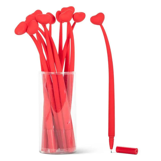 Red silicone pen with heart-shaped ends in a clear plastic container on a white background