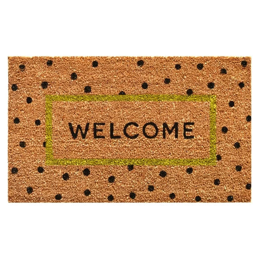 coir doormat with black polka dots and welcome printed in center