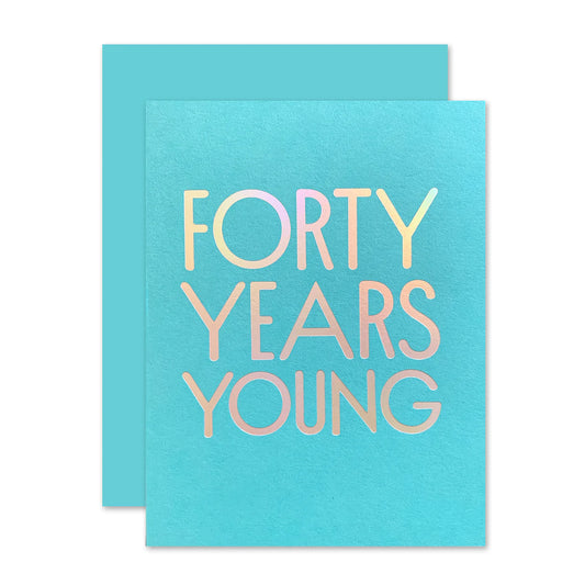 Blue card with silver words on the middle