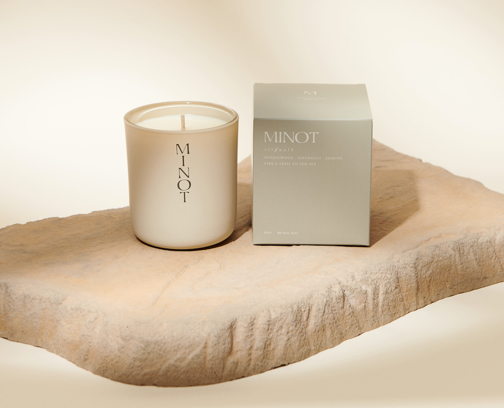 Minot candle cliffwalk with candle box in a neutral background