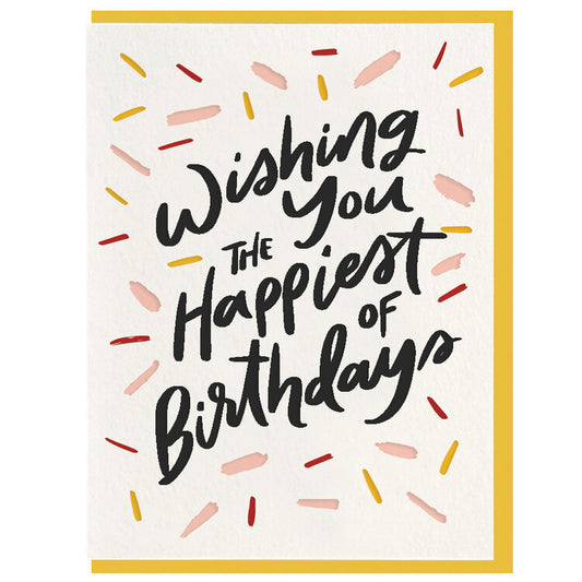 White card with colorful pinks and yellows and big, black cursive words from top to bottom