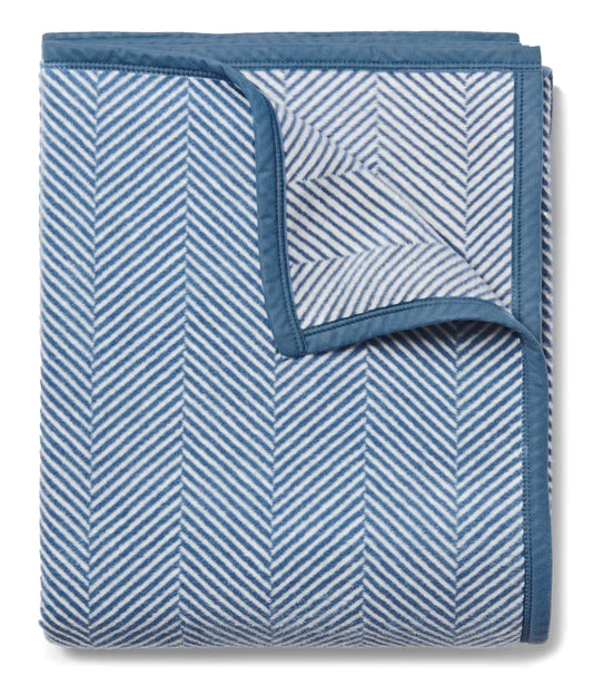 Light Blue Herringbone pattern folded blanket