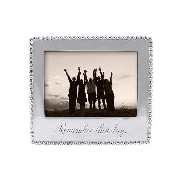 Silver frame with beaded edge. The words Remember this day are engraved in bottom center in a script font