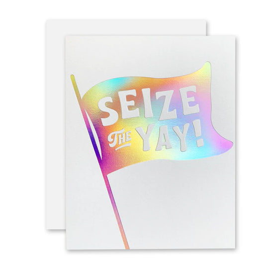 White card with tie-dye flag in the middle that has words on it