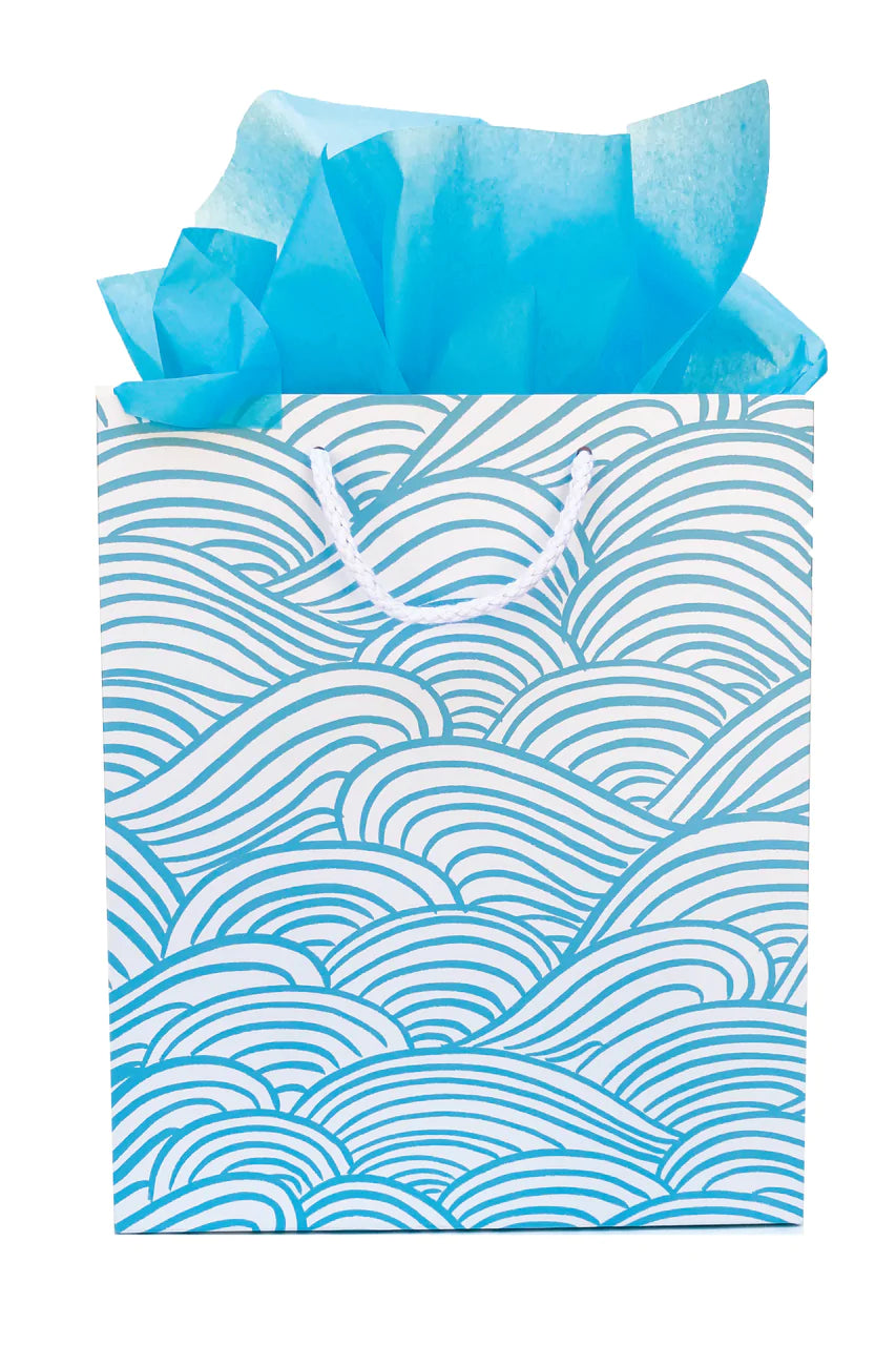 Gift bag with blue waves all over it