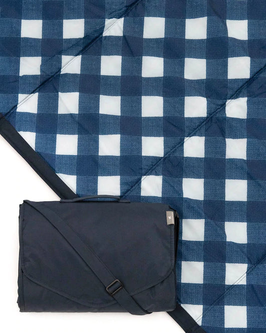 This small, water-resistant blanket is great for both outdoor and indoor play. Its  bag-less, compact fold makes packing up quick and easy and an adjustable carrying strap and a pocket makes this on-the-go blanket a true stroller and trunk essential